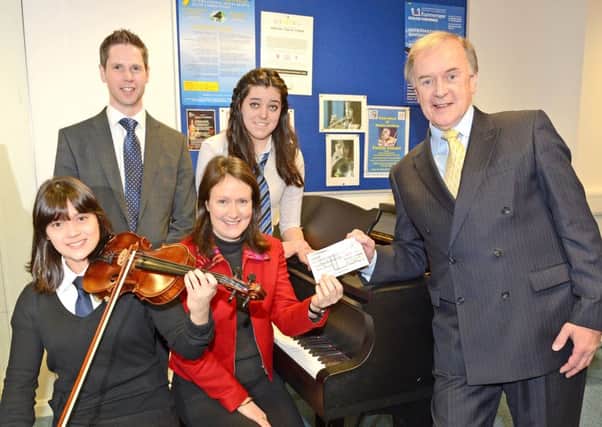 Douglas Academy, concert to mark the retirement of Head of Music Mr Derek Norval, in 2015. The proceeds of the concert Â£754 was donated to Bobath.