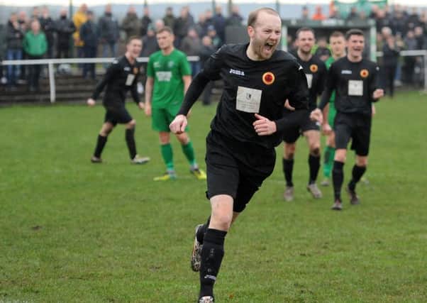 Kirk Forbes celebrates after putting Rossvale two up