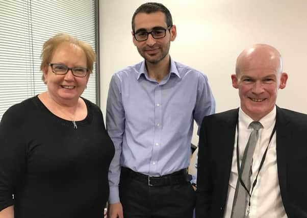 Motherwell and Wishaw MP Marion Fellows and Wishaw GP Dr Alex Logan meet Dr Ghaith Rukbi after they fought to allow him to come to Scotland.