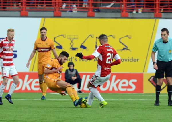 Lee Lucas's challenge on Massimo Donati which saw the Motherwell midfielder sent off against Hamilton Accies (Pic by Alan Watson)