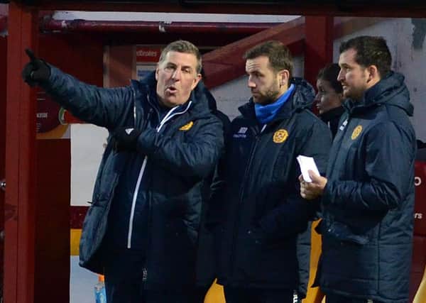 Mark McGhee and his backroom staff are trying to get Motherwell past Rangers this weekend (Pic by Alan Watson)