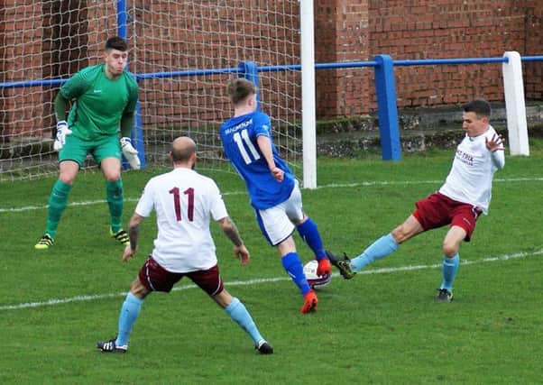 Cumbernauld can's stop Ben Black opening the scoring for Irvine Meadow (pic by Robert Ritchie)