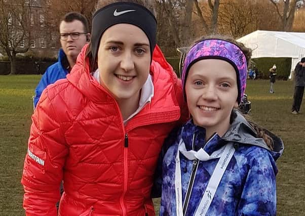 Valencia Wright, from Lenzie, with Laura Muir at the inter-district championships in Edinburgh
