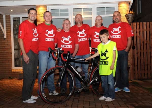 Craig Dymock (far right) participated in several charity cycles in aid of CHAS