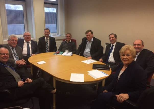 Members of the new Independent Alliance meet at council HQ.