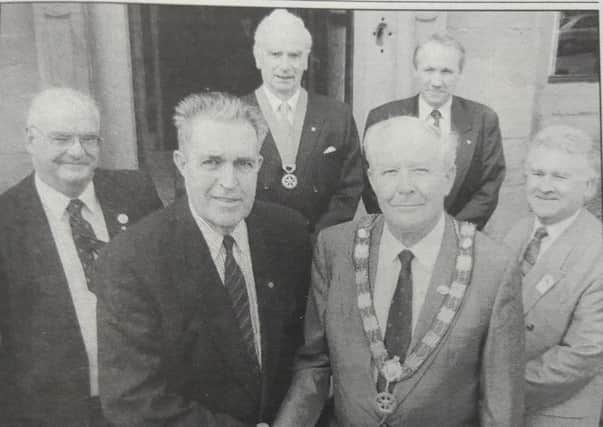 Ronald Morrison being installed as president of Motherwell and Wishaw Rotary Club in 1998