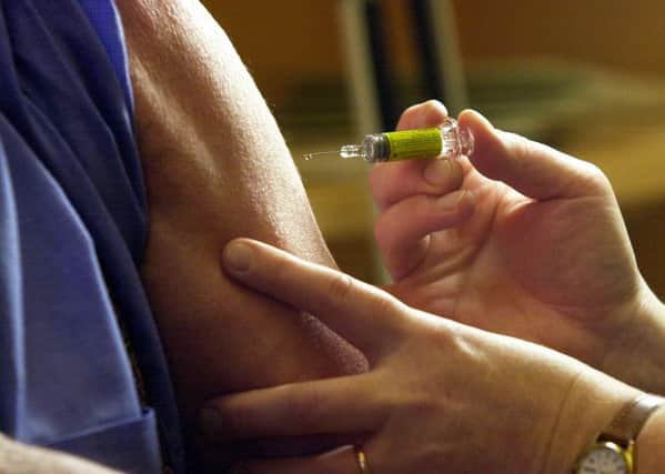 Scotland's deputy chief medical officer is urging more people to get a flu jab.