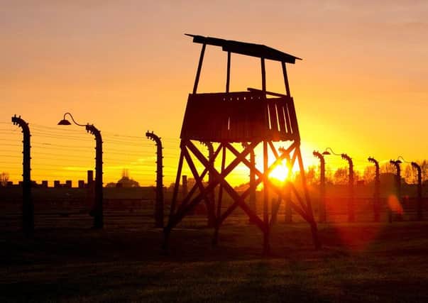 The camp watchtower at Auschwitz 1. For how many would a sunseet like this have been their last view?