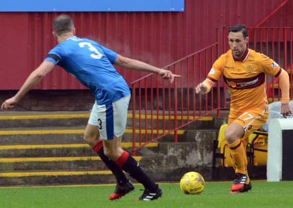 Scott McDonald (right) scored Motherwell's opening goal in the victory at Ross County (Pic by Alan Watson)