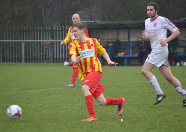 Steven Seaton on the ball, watched by new signing Chris Dolan (pic by Helen Templeton).
