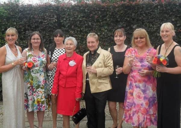 Phyllis Love, fourth from left, with her seven surviving daughters at a happy family occasion in 2012. She also had 32 grandchildren and 21 great grandchildren.
