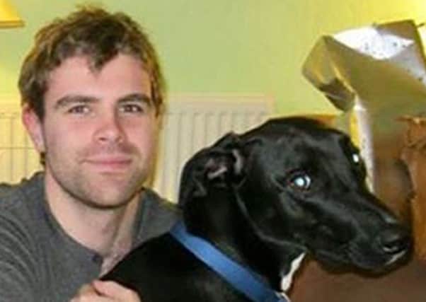Cameron Logan with his dog Gomez, they were both killed in a deliberate house fire in Milngavie.