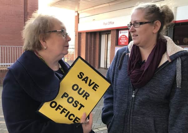 Motherwell and Wishaw MP Marion Fellows talking to constituent Cassandra McHale outside the Brandon Parade branch of the Post Office.