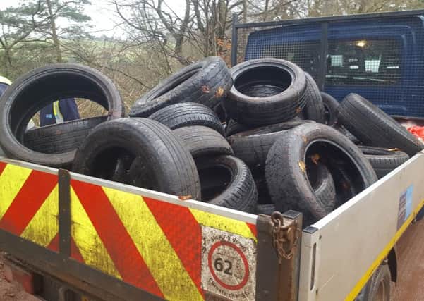 Tyres dumped in the glen down from Castlebank Park, Lanark, were lifted by volunteers and removed by the council.