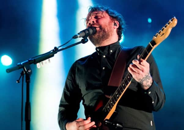 Frightened Rabbit singer Scott Hutchison on stage in Edinburgh at Hogmanay.