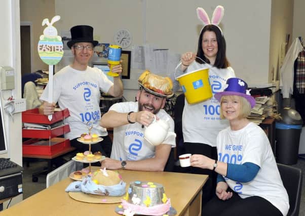 You don't have to be mad to work here - but it helps! Staff at your Milngavie and Bearsden Herald get in on the action.