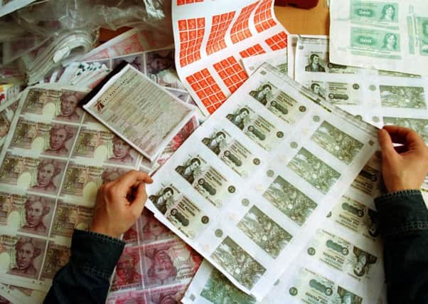 Fake bank notes are being produced.