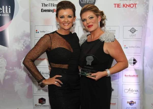 Corrine Thomson (right) with Tracey Ford from F3 Entertainments Ltd after winning the Confetti Wedding Award for Reception Entertainer of the year 2017