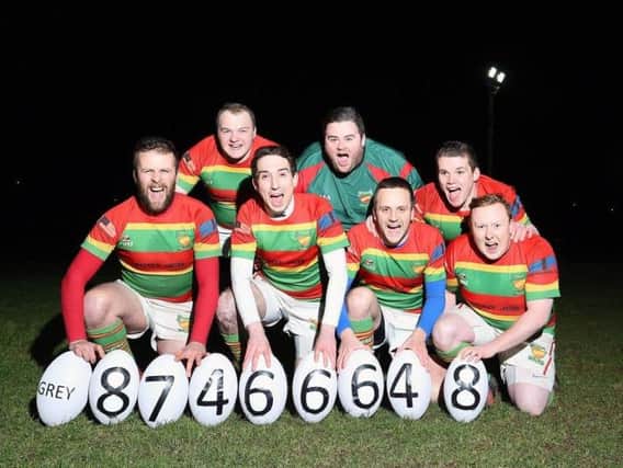 Rugby players help search for South Lanarkshire winning Lottery player.