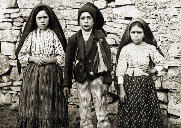 In the summer of 1917 three shepherd children, LÃºcia Santos and her cousins Jacinta and Francisco Marto reported Our Lady had appeared to them at the Cova da Iria, in Fatima, Portugal.