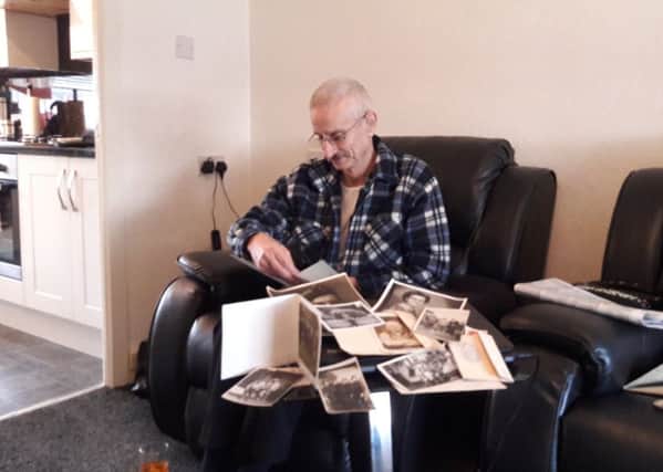 Sandy Atkinson looks at some of the photographs and documents from Betty Boyle's box