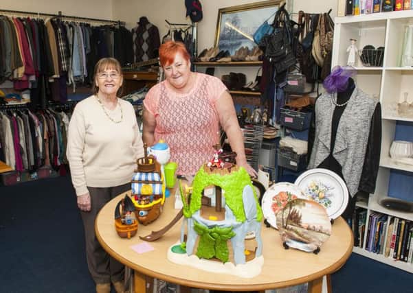 Joan Queen and Linda Mitchell are two of the volunteers at the charity shop. Picture Sarah Peters.