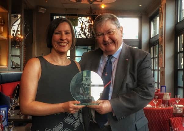Livia Bell, general manager, Holiday Inn, Glasgow, pictured with Maurice Taylor founder of La Bonne Auberge