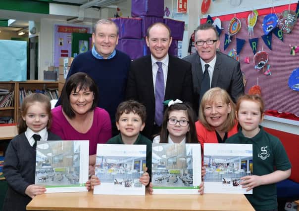 Sacred Heart and Lawmuir head teachers Karen Sommerville (left) and Lorraine Hunter with pupils from both schools join Education convener Frank McNally (centre) and Bellshill councillors Harry McGuigan (left) and Harry Curran to launch the plans.