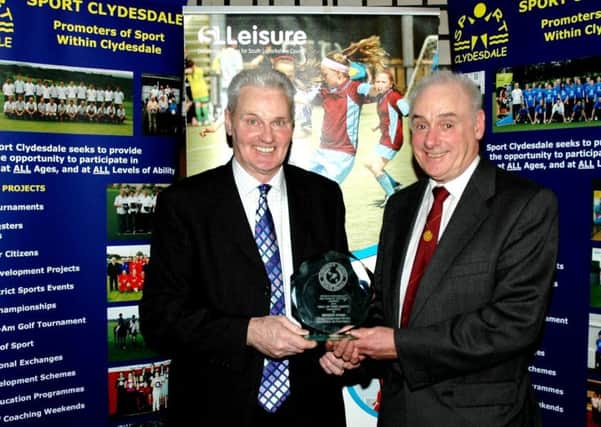 Roger Hynd (left) receives a Lifetime Achievement award from Millar Stoddart at 2011 Clydesdale Sports Personality of the Year Awards (Pic by John Prior)
