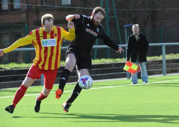 Rossvale and new signing Stephen McGladrigan found the going hard against Greenock