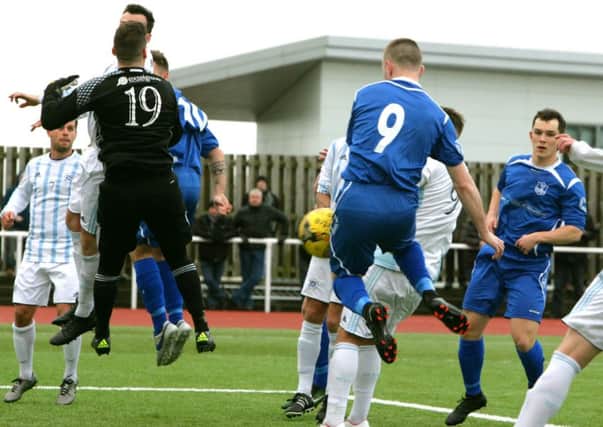 Ian Watt scores Rovers' first goal in the cup replay against Gartcairn (Pic by Jim Clare)