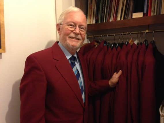 Secretary Glyn Price has a wardrobe full of red jackets waiting for singers
