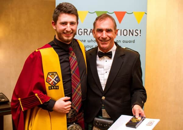 Iain Munro, newly inducted into Strathclyde University Sports Hall of Fame, received his award from Calvin Hepburn of Strathclyde Sports Union (also pictured)