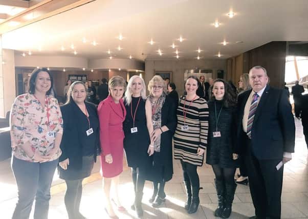 Supporters of Newarthill Library committee at the Scottish Parliament with First Minister Nicola Sturgeon (third, left), Uddingston and Bellshill MSP Richard Lyle and Kira Brown  (second, right) from Mr Lyle's team.