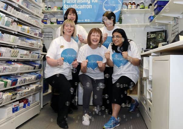 07-03-2017. Picture Michael Gillen. KILSYTH - Boots. West Burnside Street. Team of employees and relatives have signed up for Bubble Rush in aid of Strathcarron Hospice. Back row; Ann Leslie, pharmacy technician and Sandra Irvine, pharmacy technician. Front row; Gail Robertson, pharmacy dispenser; Sharon Rankin, pharmacy dispenser and Anneila Qurban, pharmacist, mananger.