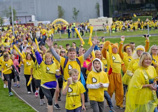 Off the Beatson Track... 
A sea of yellow ready to walk through Glasgow to raise money for the Cancer Charity.

 Pic by Alan Peebles