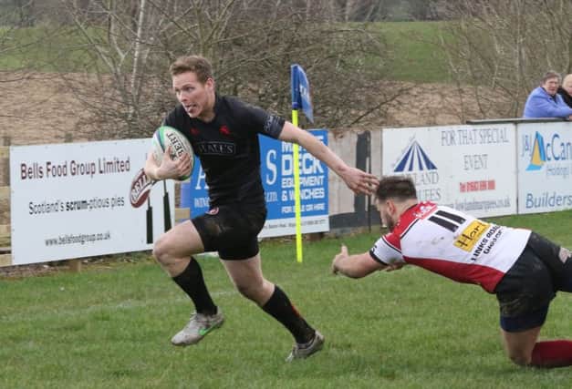 Richard Peacock scores a try in Biggar Rugby Club's 43-17 home win over Preston Lodge (Pic by Nigel Pacey)