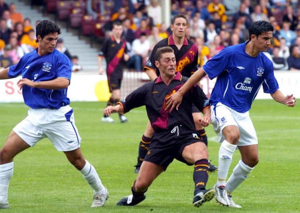 Motherwell v Everton, July 2005. Mikel Arteta, Scott Leitch, Phil O'Donnell and Tim Cahill.