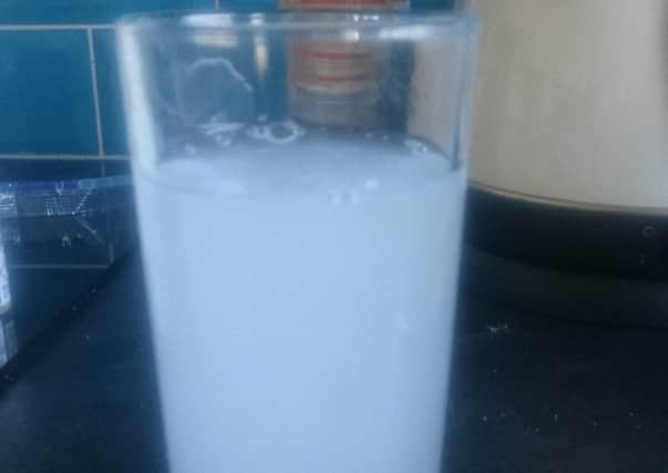 A glass of cloudy water that came out of Cat Dormer's tap in Newarthill