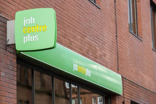 The Scottish government has said it was "completely unacceptable" that it was not consulted on plans to close half of Glasgow's job centres.