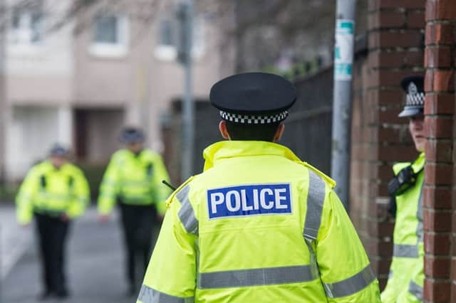 A woman is alleged to have assaulted a police oficer in Milngavie this week.