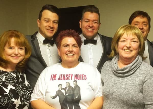 A musical night to remember for fundraisers Mary Mone, Linda Baird and Rosemary Forsyth, pictured with the Jersey Notes