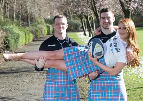 Glasgow Warriors Nick Grigg and James Malcolm with Lucy Kerr