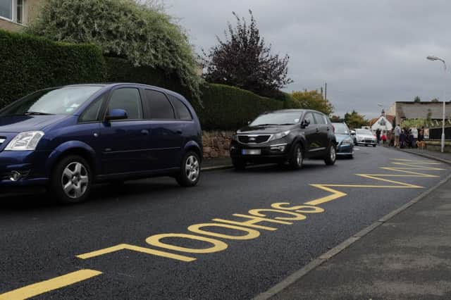 Inconsiderate parking near schools can be dangerous.