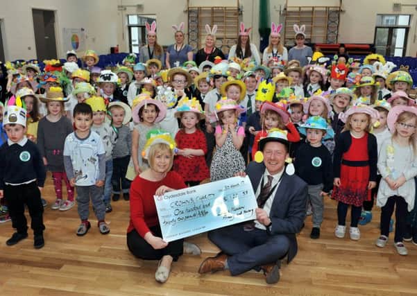 31-03-2017 Picture Roberto Cavieres. 
 LENZIE Meadow Primary School, P1s taking part in Mad Hatter's Easter Bonnet parade. Part of Herald's charity competition