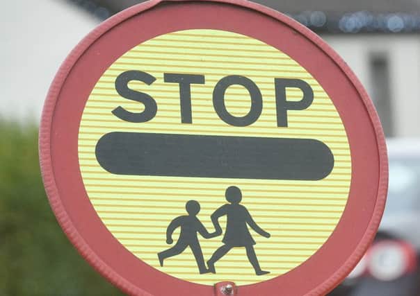 Crossing patrols are being axed throughout South Lanarkshire