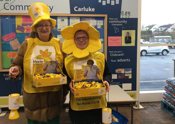 Claudia Beamish MSP and Councillor Lynsey Hamilton collect for Marie Curie in Carluke Tesco