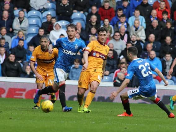 Carl McHugh in action for Motherwell at Ibrox (Pic by Ian McFadyen)