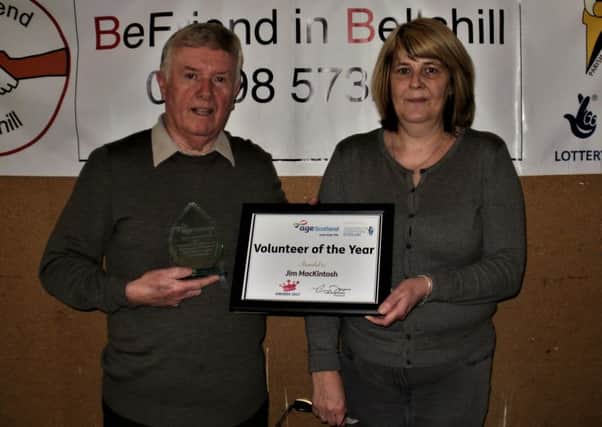 Jim and Maureen Gallagher show off award