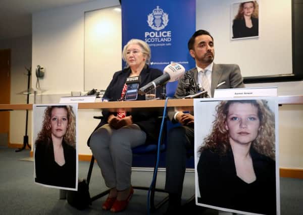 Margaret Caldwell, mother of Emma Caldwell, sits alongside solicitor Aamer Anwar during a police press conference. Pic: Jane Barlow/PA Wire